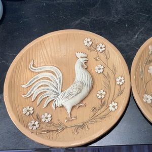 Two chicken plate decorations